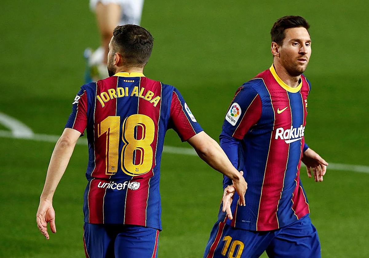 Jordi Alba y Messi, en un partido del Barça