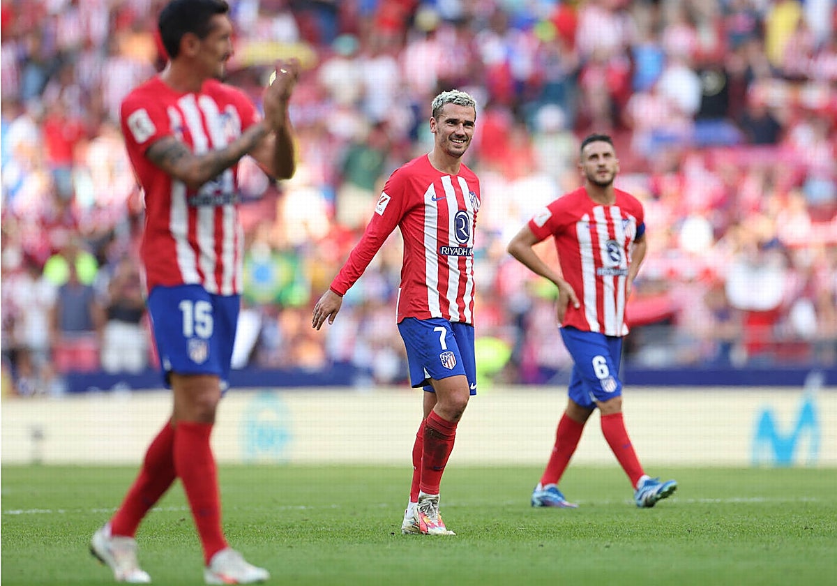 Los jugadores del Atlético, felices tras el triunfo