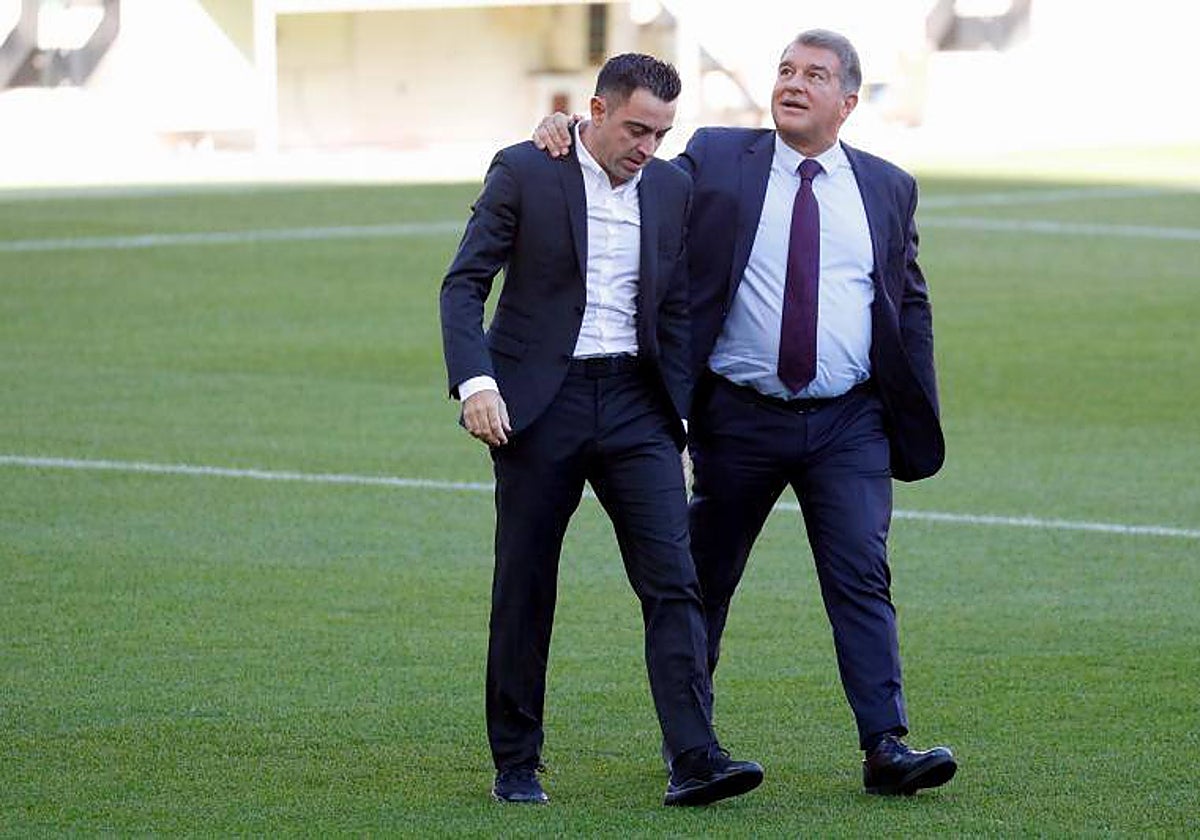 Xavi y Laporta, el día de la presentación del primero