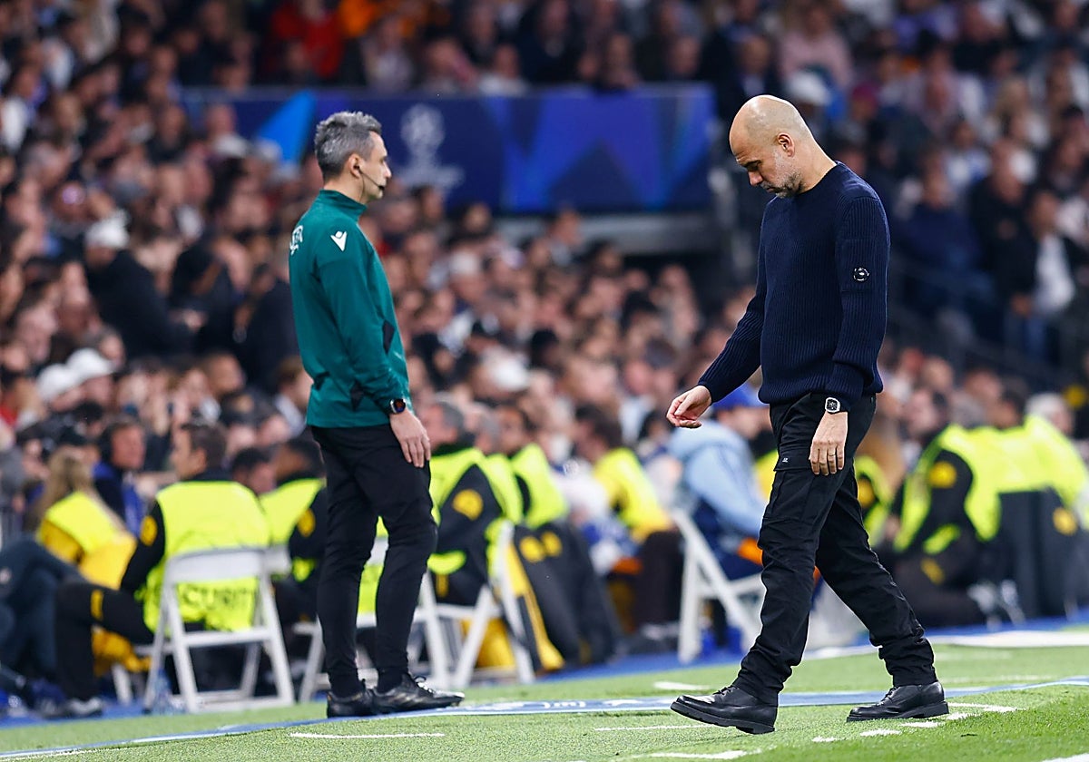 Guardiola, cabizbajo en el Bernabéu