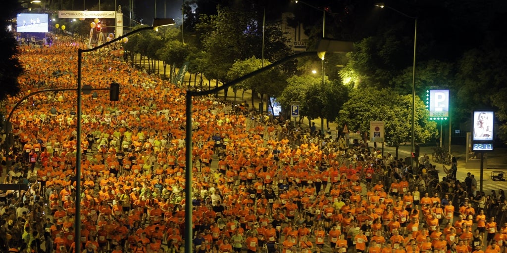 En puertas de la Carrera Nocturna de Sevilla más multitudinaria de la historia