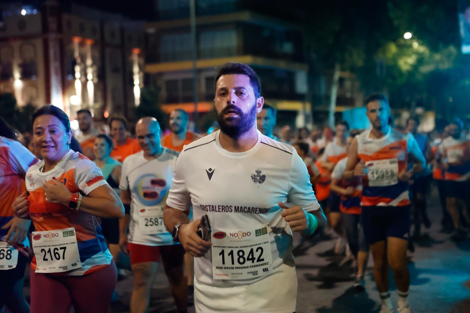 Búscate en la galería de imágenes de ABC de la Carrera Nocturna de Sevilla 2025