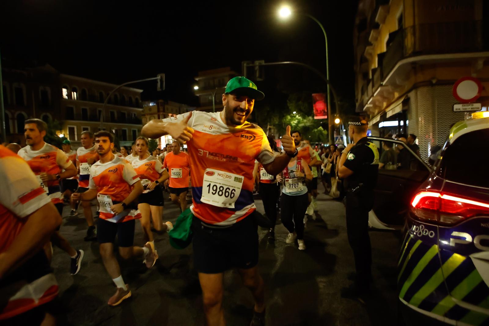 Búscate en la galería de imágenes de ABC de la Carrera Nocturna de Sevilla 2025