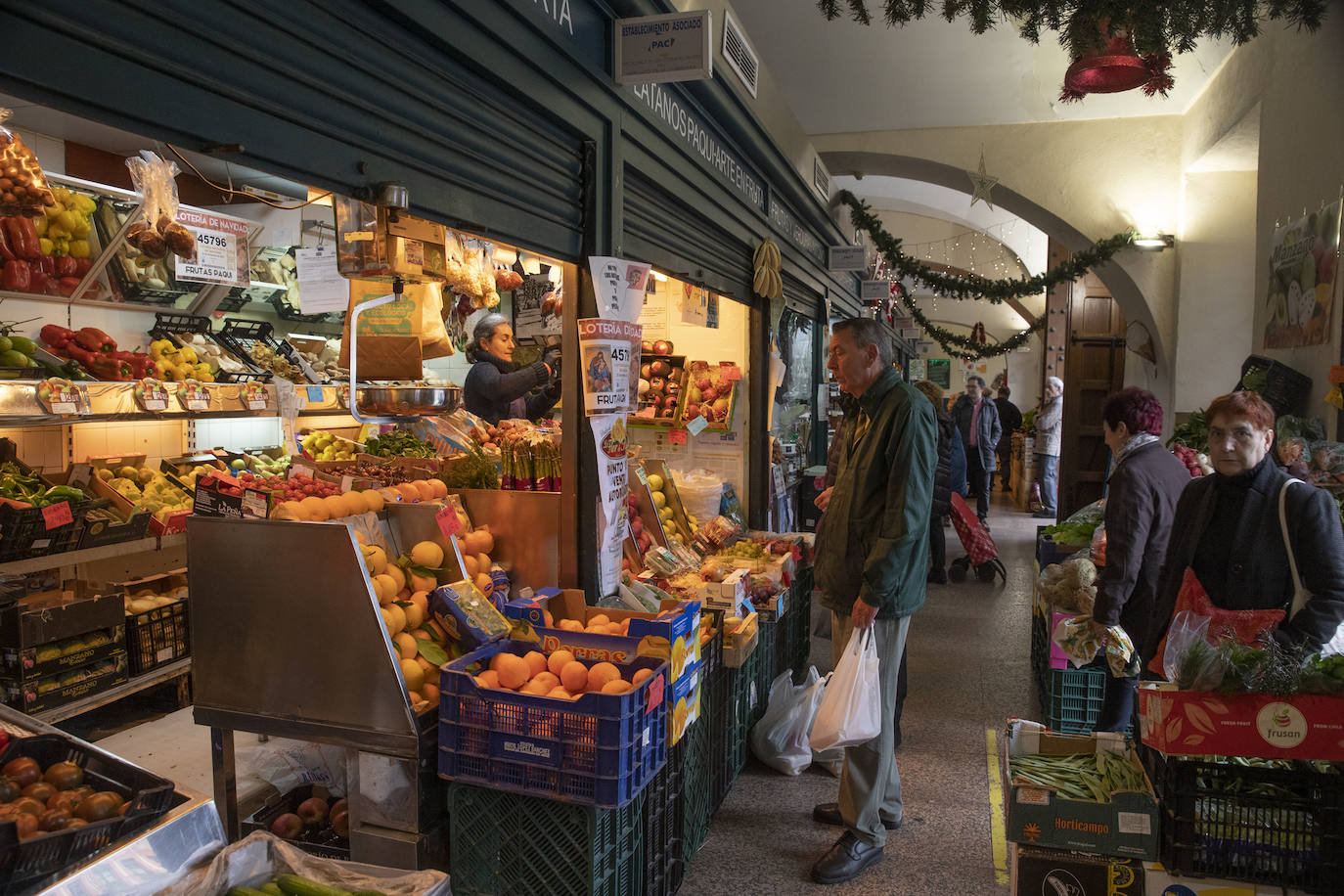 Las compras para la cena de Nochebuena en Córdoba, en imágenes