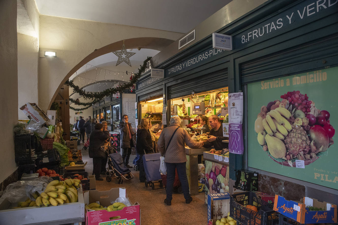 Las compras para la cena de Nochebuena en Córdoba, en imágenes