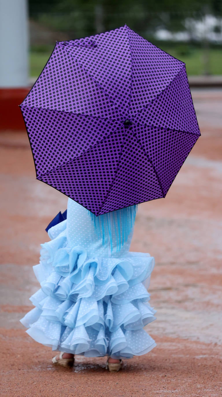 La Feria de Córdoba bajo la lluvia en imágenes