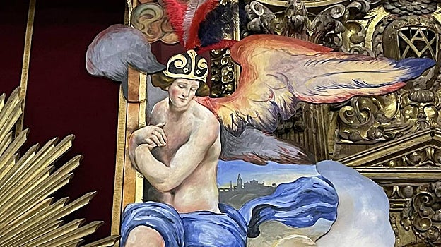 El ángel efebo a la derecha de la Virgen, tras el que se aprecia un paisaje de Córdoba