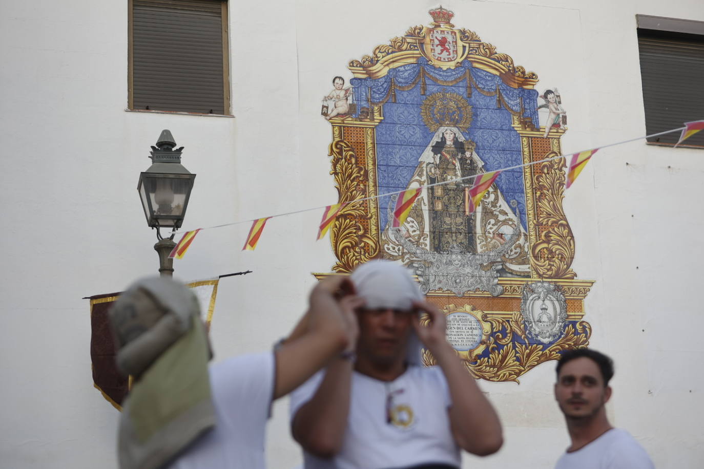 La Virgen del Carmen de San Cayetano de Córdoba siembra la alegría, en imágenes