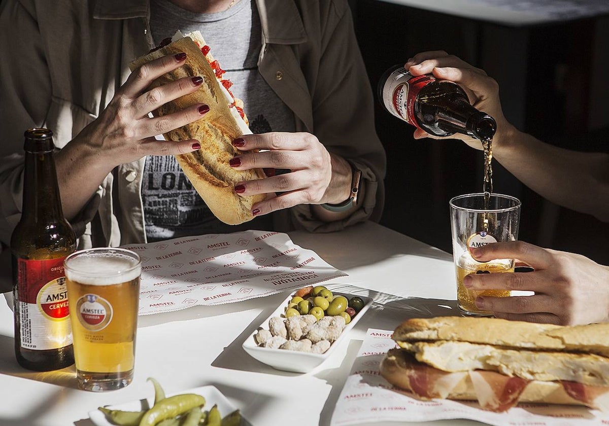 Imagen de un tradicional almuerzo valenciano acompañado de cerveza Amstel