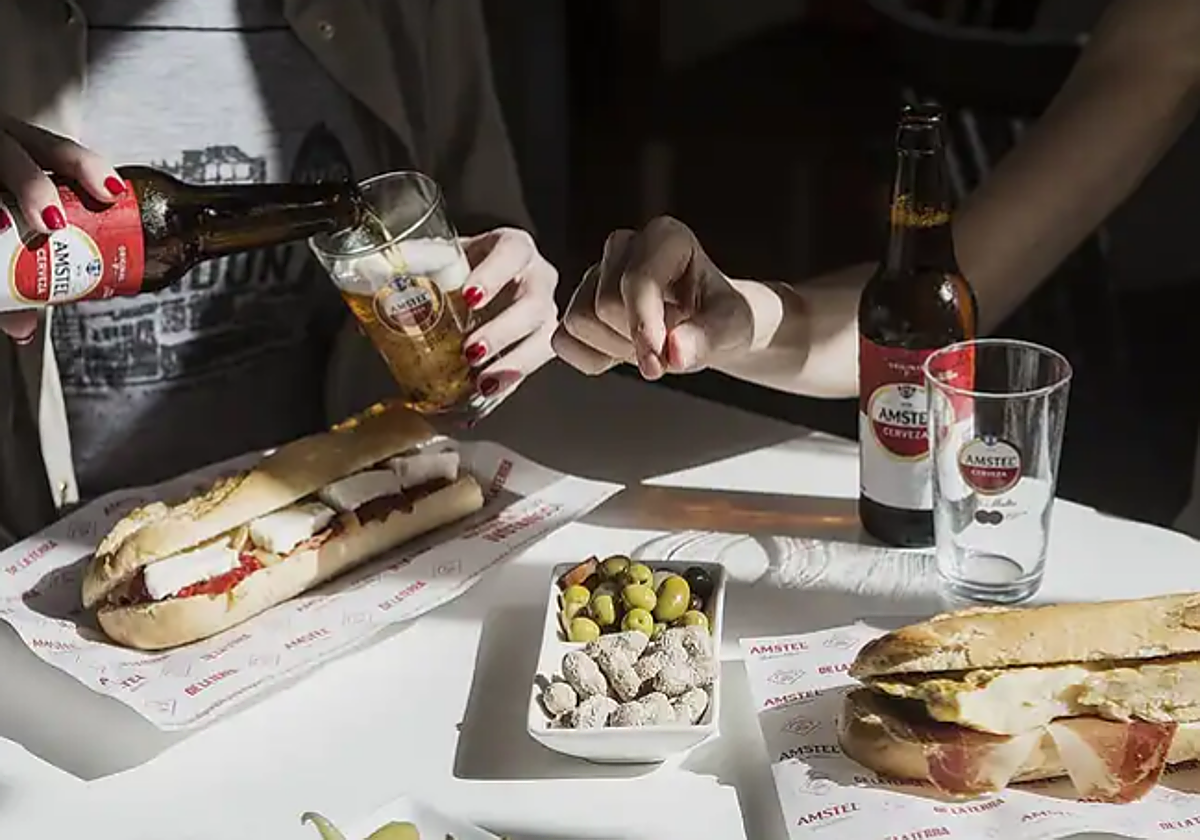 Imagen de un tradicional almuerzo valenciano acompañado de cerveza Amstel