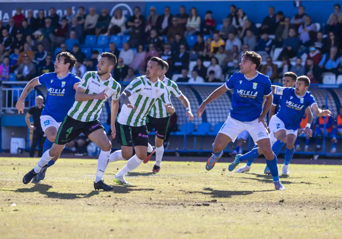 Lapeña e Iván Rodríguez durante el partido de ida ante el Melilla