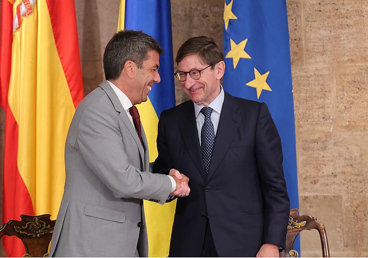 El presidente de la Generalitat Valenciana, Carlos Mazón, y el de Caixabank, José Ignacio Goirigolzarri