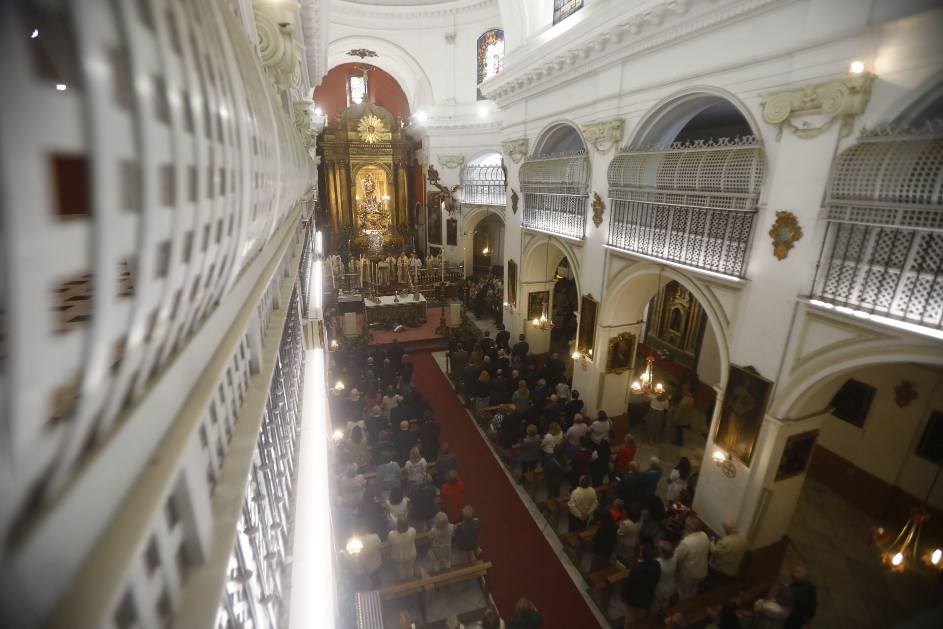 La tradicional misa de San Rafael en la iglesia del Juramento, en imágenes