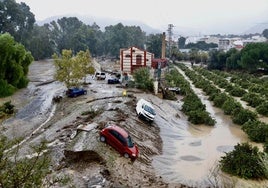 Desalojos de los vecinos en la ribera del Guadalhorce en Málaga