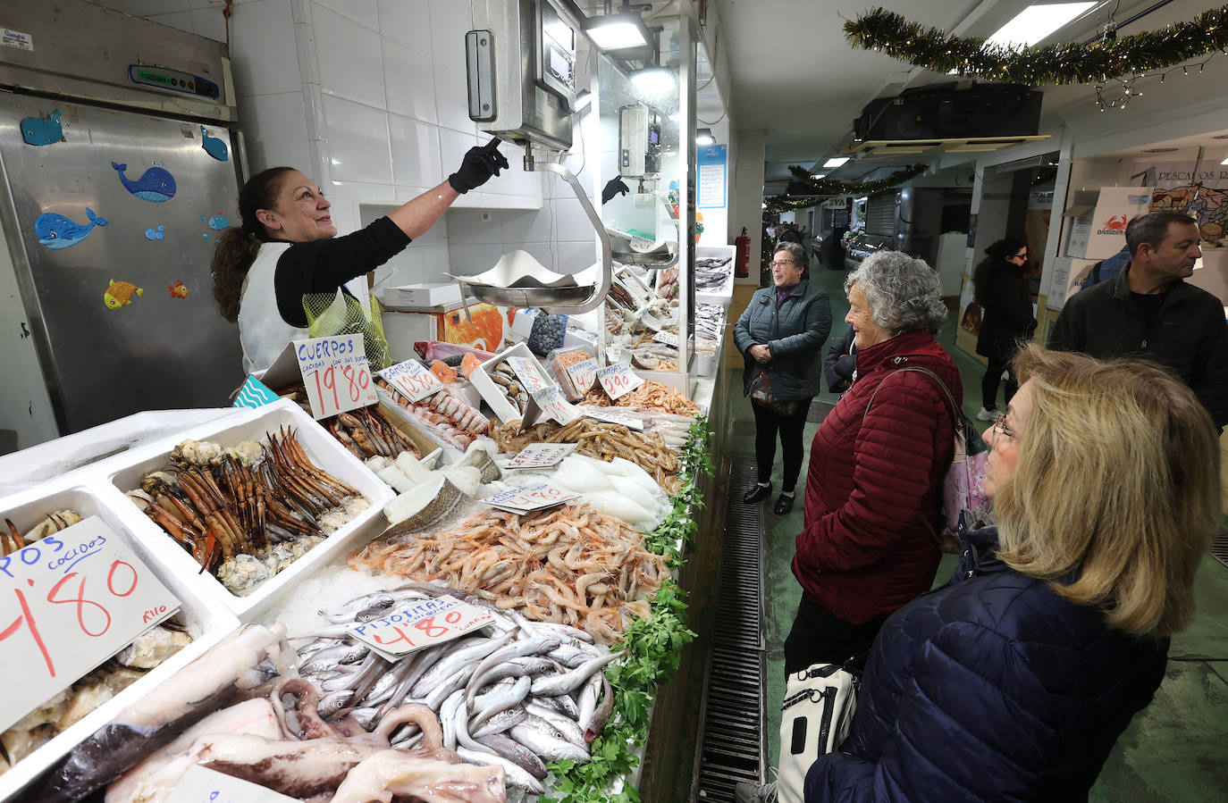 Las compras para las comidas de Navidad en Córdoba, en imágenes