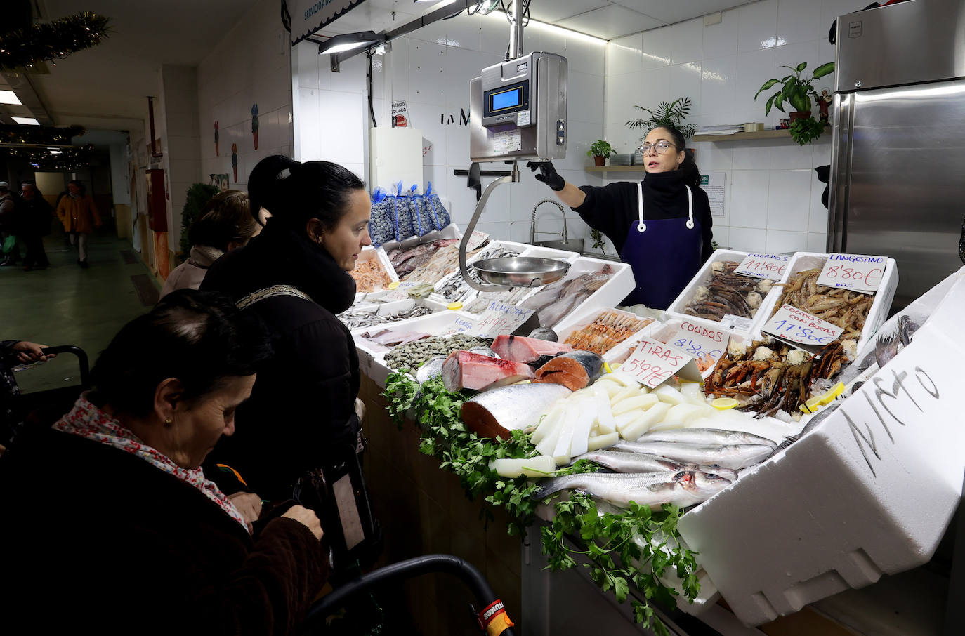 Las compras para las comidas de Navidad en Córdoba, en imágenes