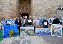 Dieciséis artistas pintan la belleza de Cañete de las Torres en su festival de 'Calles en flor'