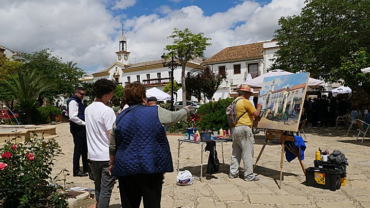 Dieciséis artistas pintan la belleza de Cañete de las Torres en su festival de &#039;Calles en flor&#039;