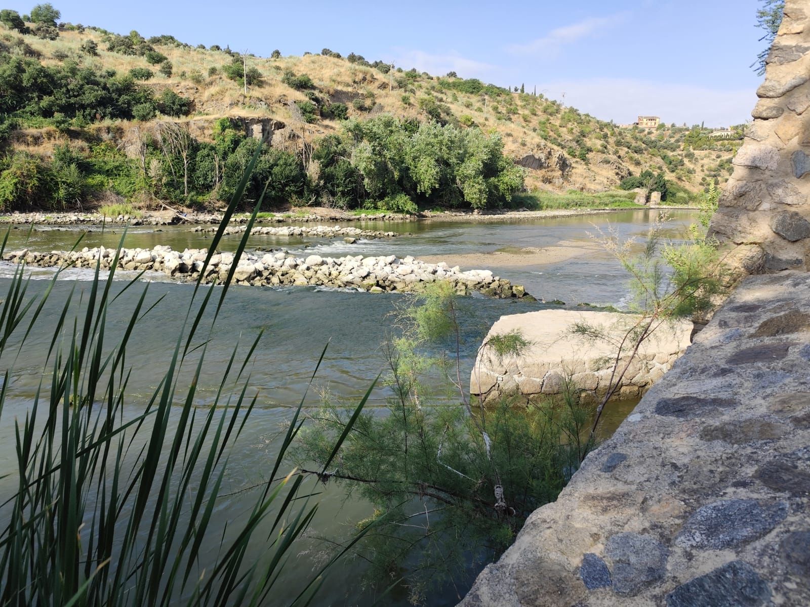 Las imágenes de la espectacular bajada del caudal del Tajo a su paso por Toledo