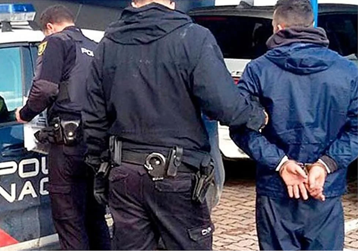 Detención de una persona en foto de archivo