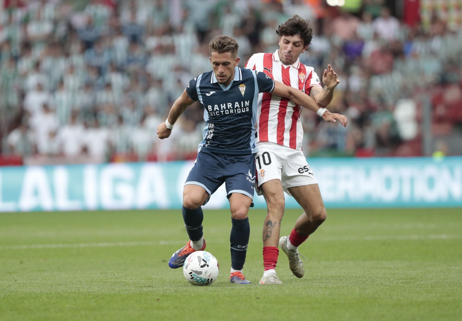 La derrota del Córdoba en Gijón, en imágenes