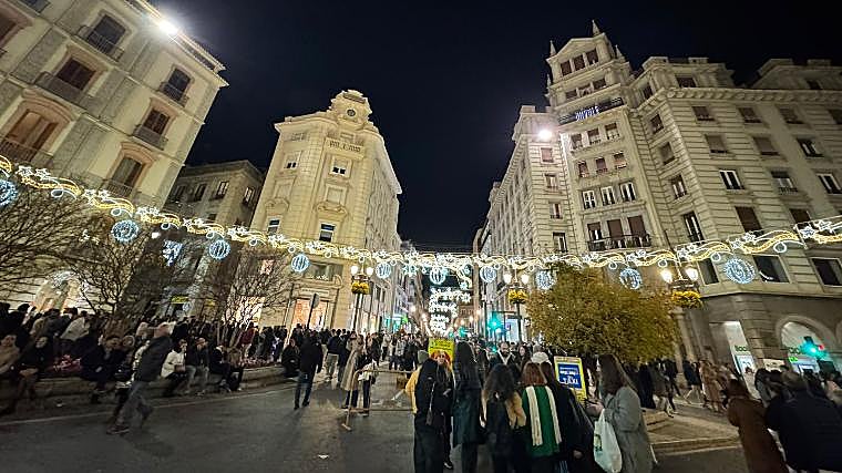 Puerta Real, the center of Granada, is already lit up as well