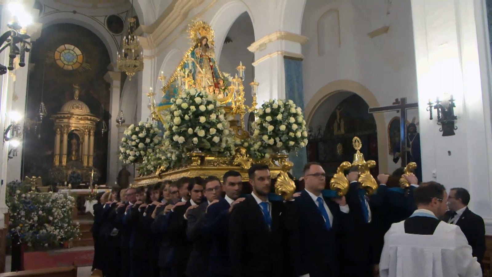La procesión de la patrona de Puente Genil, en imágenes
