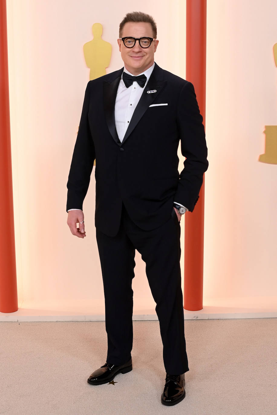 Uno de los protagonistas de la noche, el actor Brendan Fraser, nominado por su papel en la película 'La ballena'. Fue vestido de Giorgio Armani.