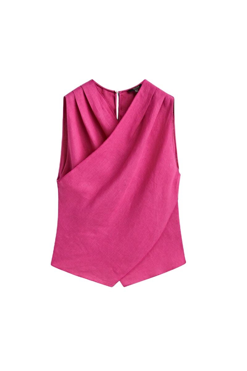 Massimo Dutti. Top de lino cruzado con escote asimétrico en la espalda (39,95€).