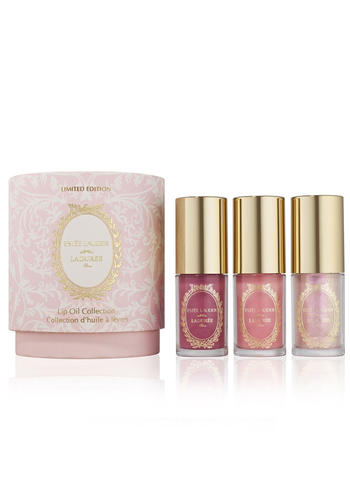 Colección de Lip Oils de edición limitada Estée Lauder x Ladurée (97 euros). Un set con tres aceites labiales de tamaño completo. Cada lip oil proporciona un brillo translúcido y hasta 12 horas de confortable hidratación. La fórmula está ligeramente infusionada con aroma a rosa y vainilla, inspirada en los eternos macarons del mismo sabor de Ladurée y todos los tonos son neutros, para sublimar todos los tonos de piel. Los tres tonos son: glacé (rosa escarchado), sucré (rosa bebé) y rosé (malva).