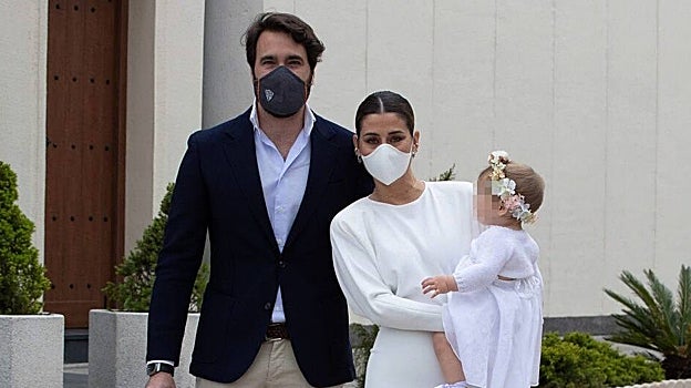 Javier Ungría y Elena Tablada en el bautizo de Camila