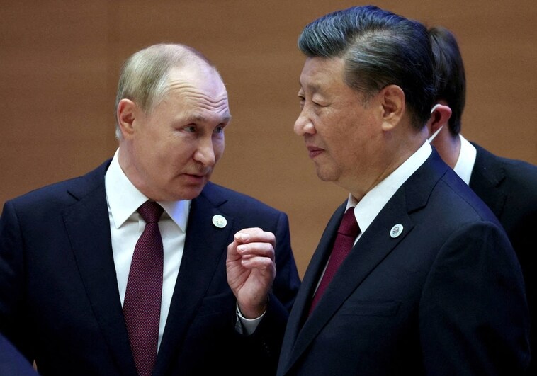 El presidente ruso, Vladímir Putin, con su homólogo chino, Xi Jinping