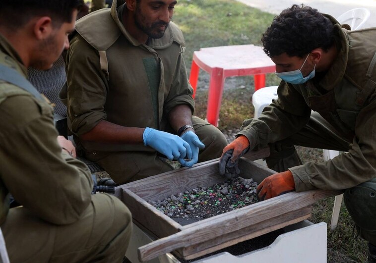 Arqueólogos para poner nombre a los asesinados por Hamás
