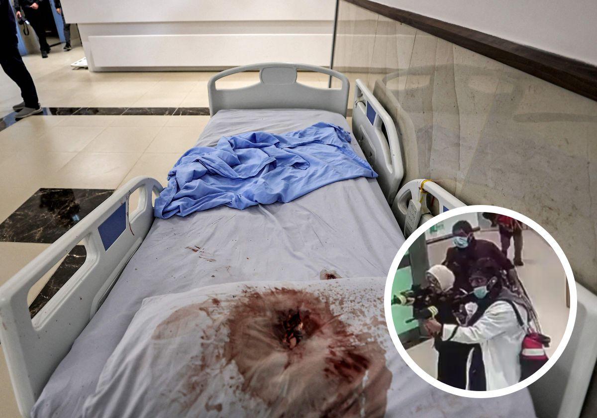 Periodistas filman cerca de una cama de hospital con una almohada atravesada por un balazo y cubierta de sangre en el hospital Ibn Sina.
