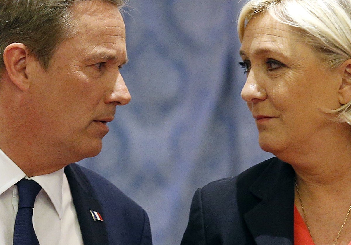 Nicolas Dupont-Aignan y Marine Le Pen, líderes de la derecha francesa