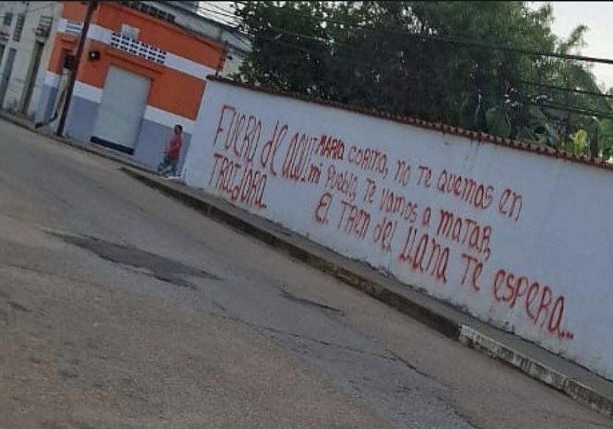 Pintada amenazando a María Corina Machado