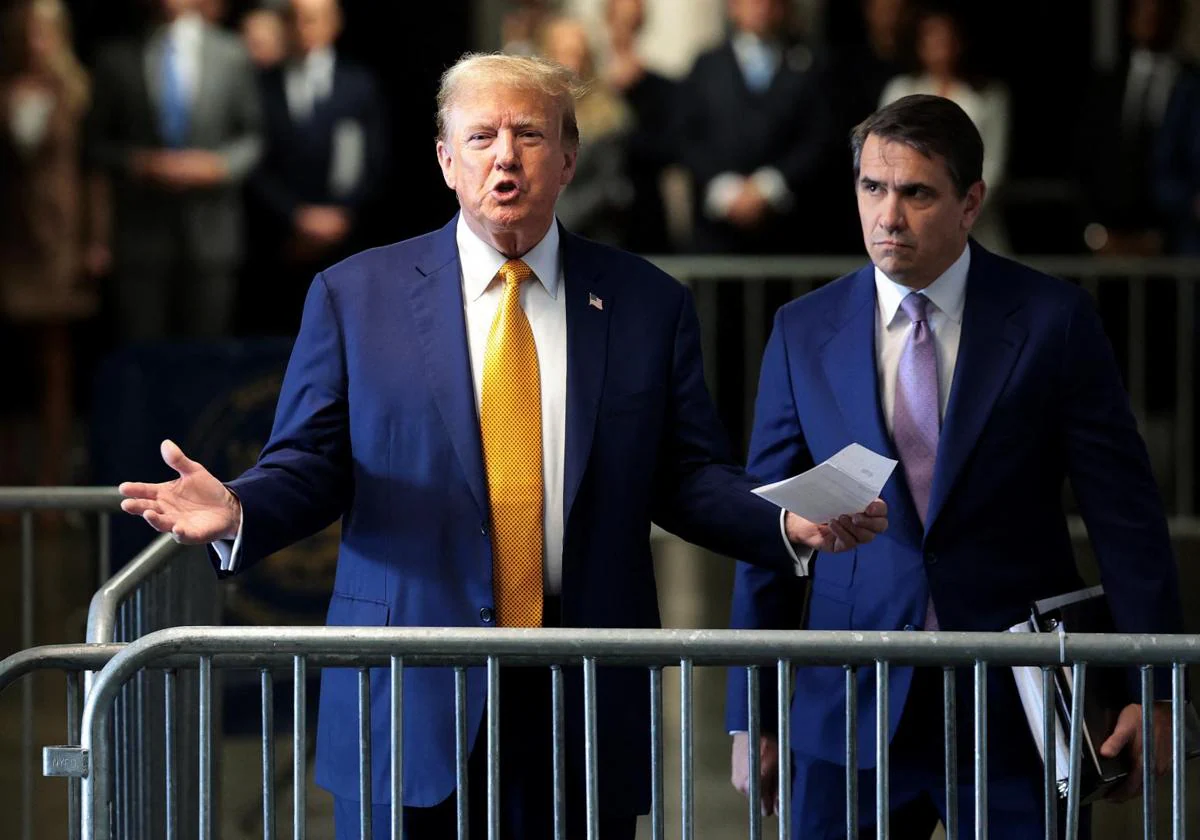 Donald Trump speaking to the press during his trial in the 'Stormy Daniels' case