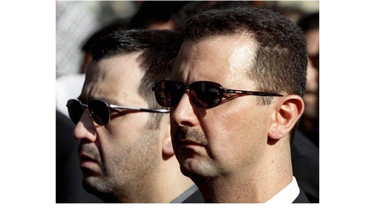 Bashar al- Assad y a su hermano Maher