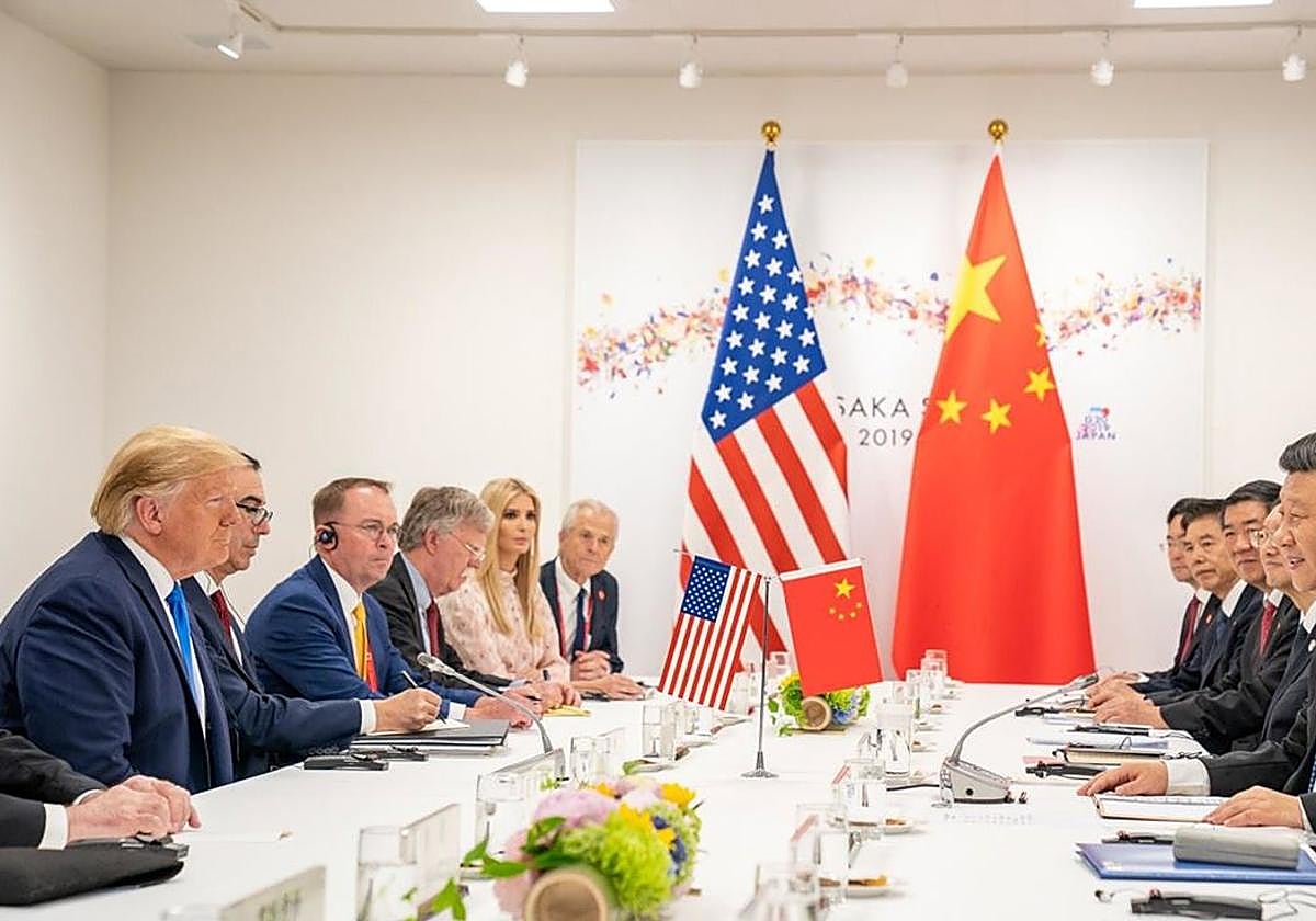 El presidente estadounidense, Donald Trump, y su homólogo chino, Xi Jinping, durante un encuentro bilateral en 2019, en el primer mandato del republicano