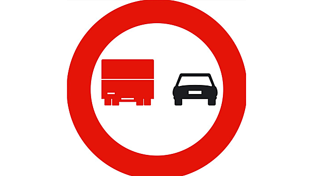 Según esta señal, ¿qué vehículos tienen prohibido adelantar?