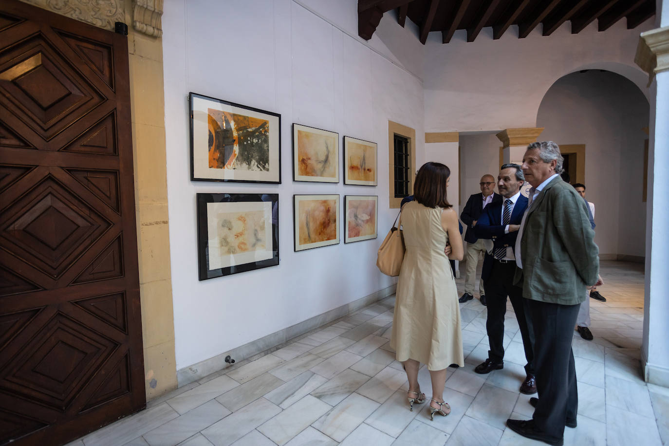 Inauguración de la exposición solidaria de la Fundación La Caixa en Sevilla