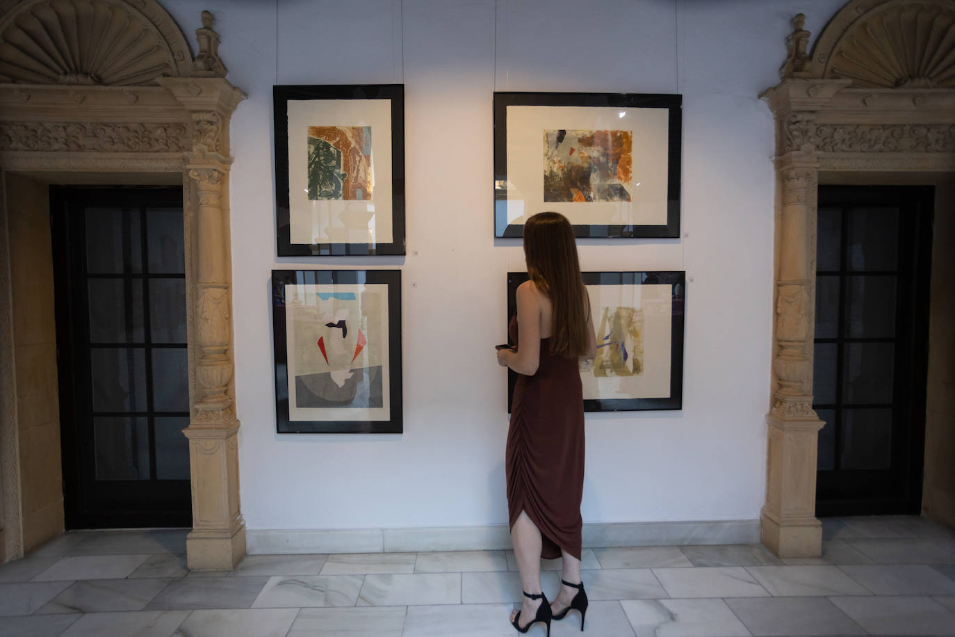 Inauguración de la exposición solidaria de la Fundación La Caixa en Sevilla