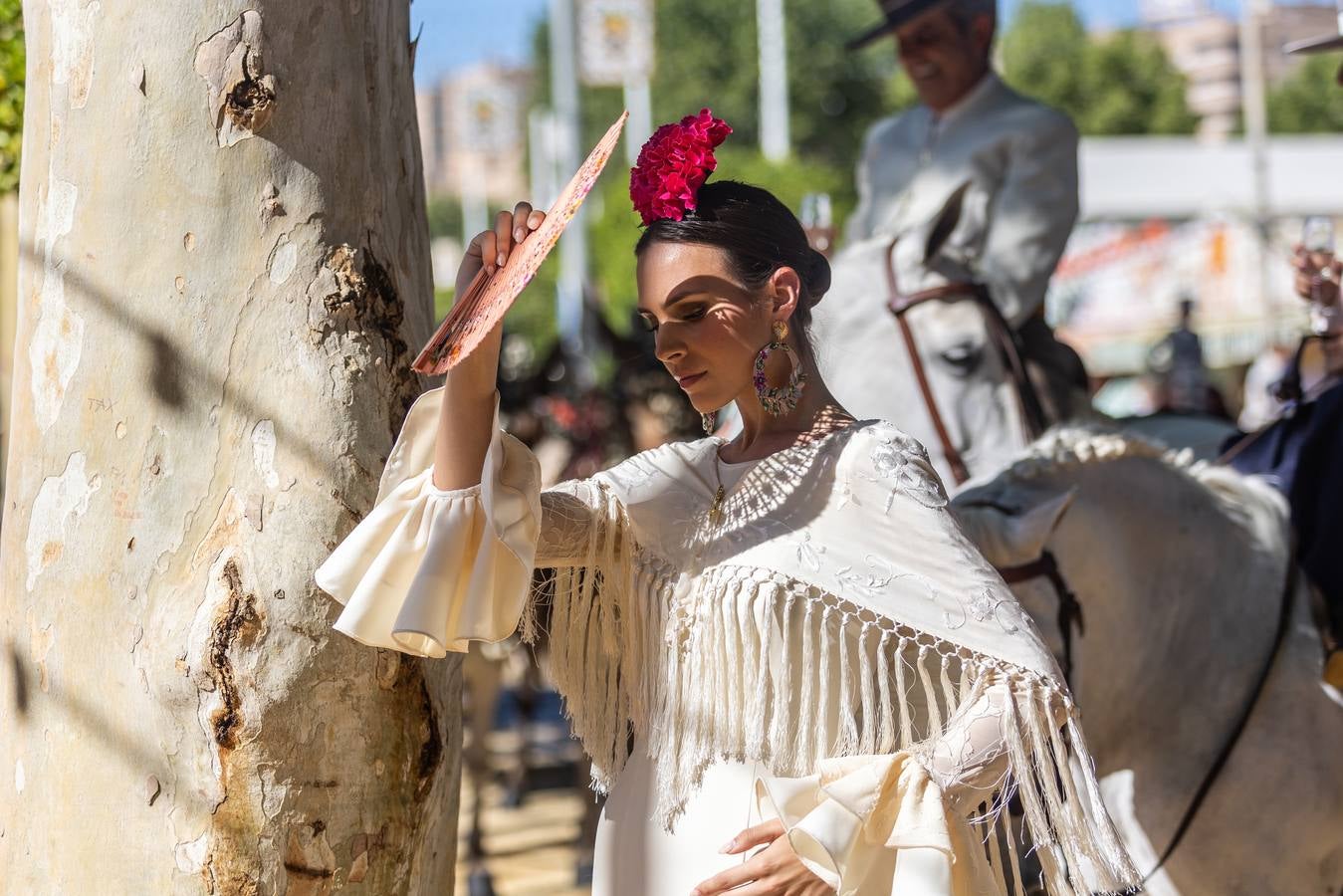 Calor y multitudes este lunes en el real de la Feria