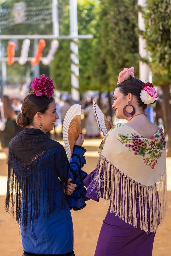 Calor y multitudes este lunes en el real de la Feria