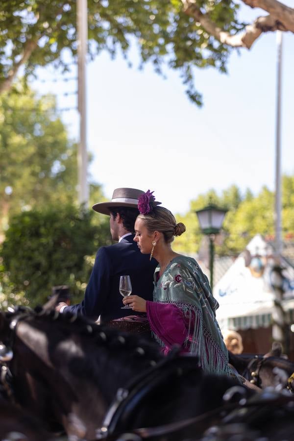 Calor y multitudes este lunes en el real de la Feria