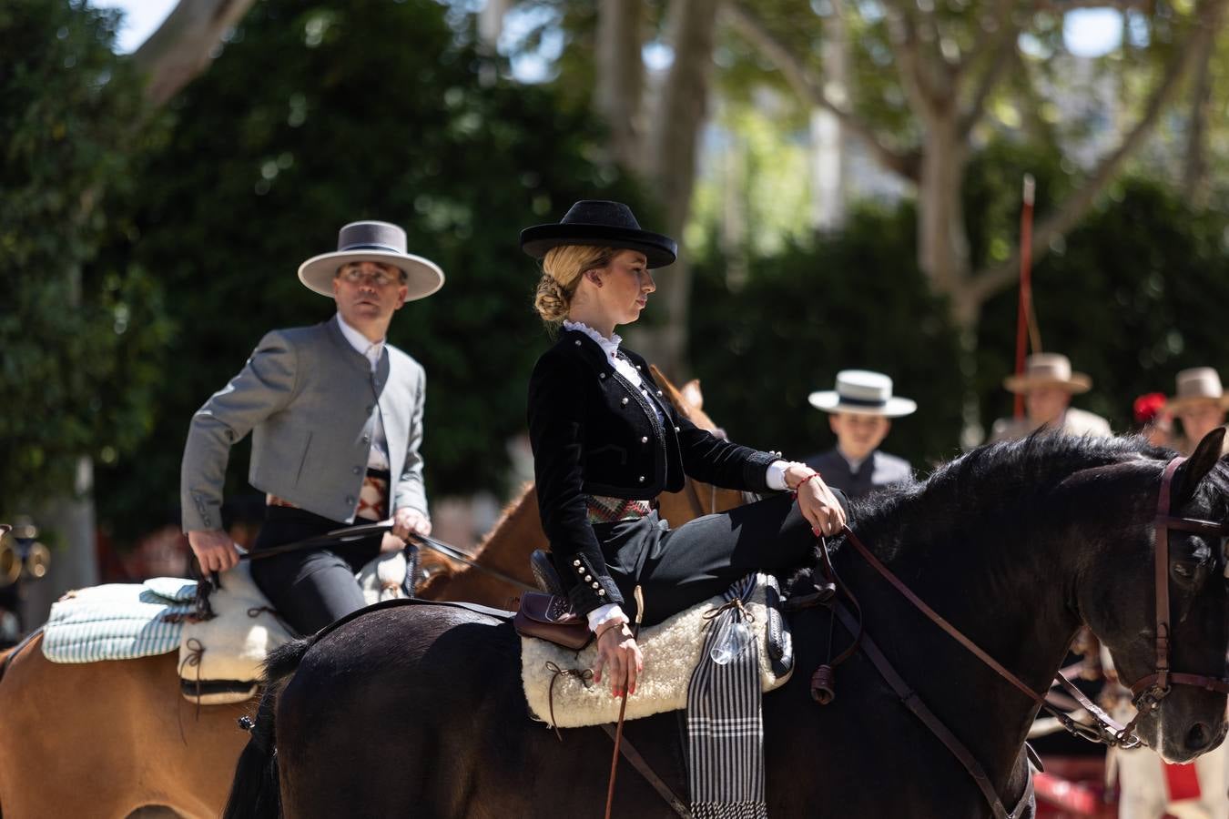 Calor y multitudes este lunes en el real de la Feria