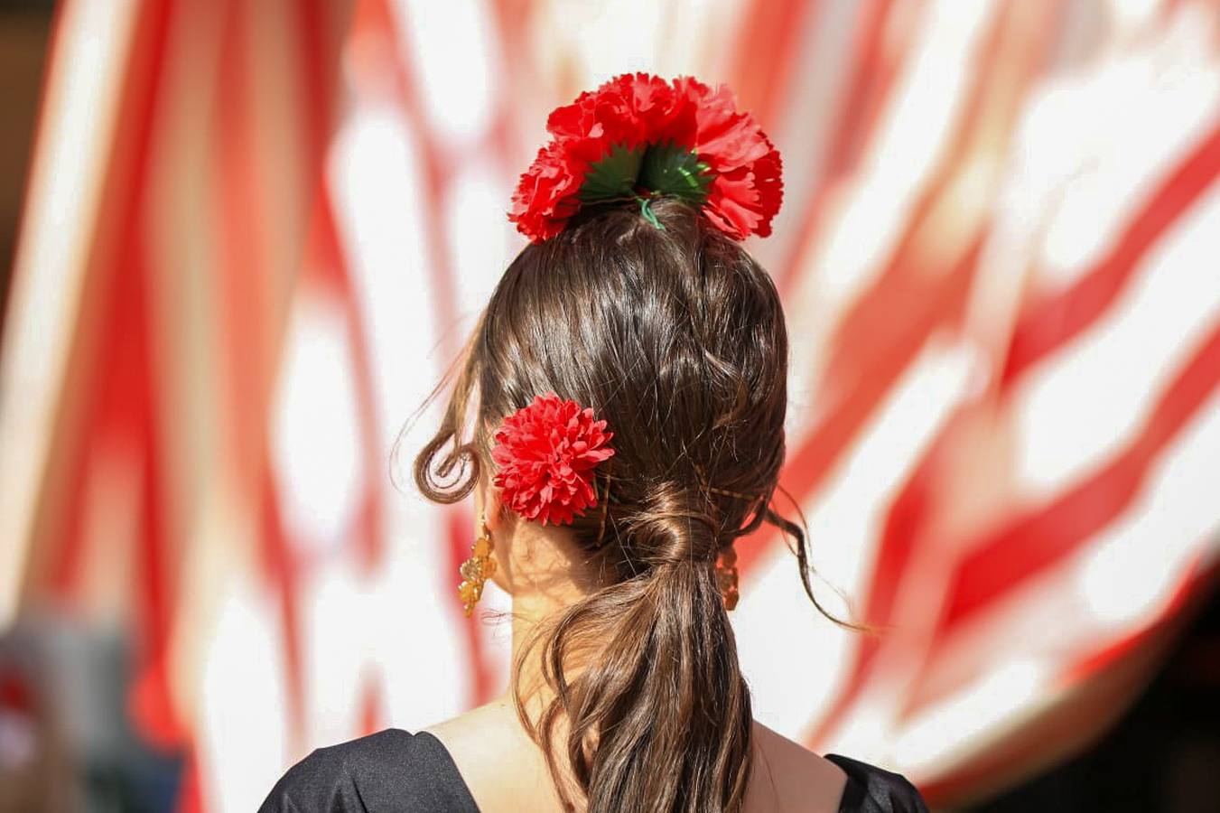 Gran ambiente en las calles del real este jueves de Feria 