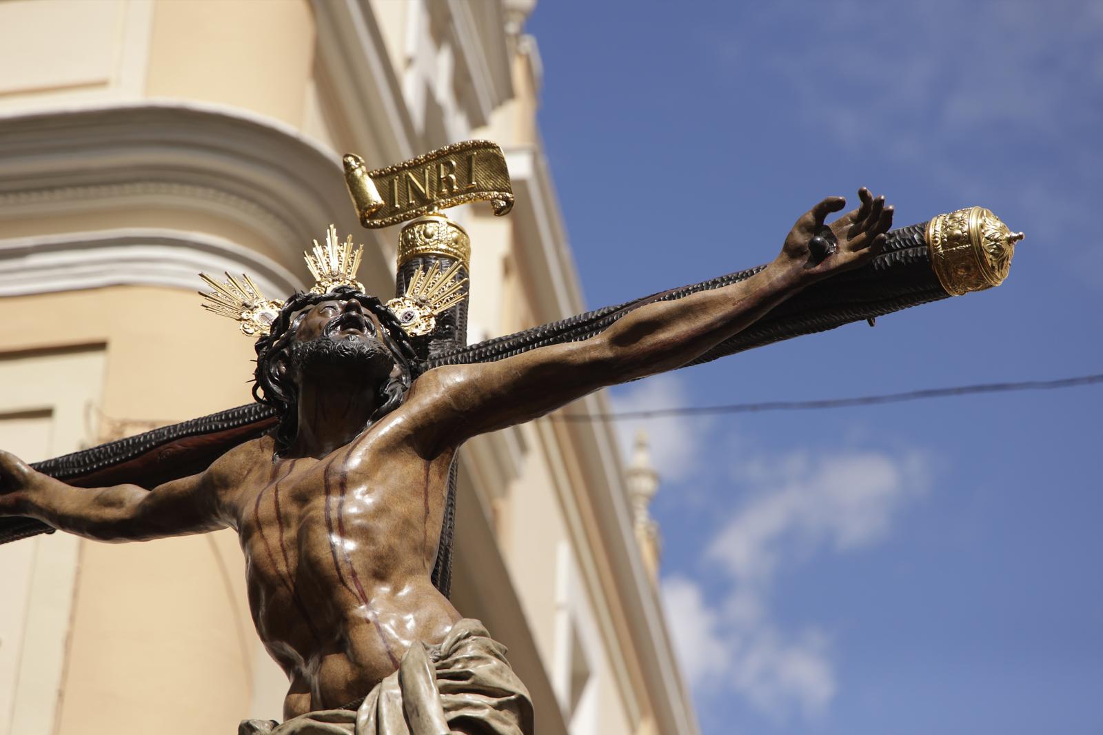 El regreso del Cristo de la Expiración del Museo de Sevilla desde San Andrés a su capilla, en imágenes