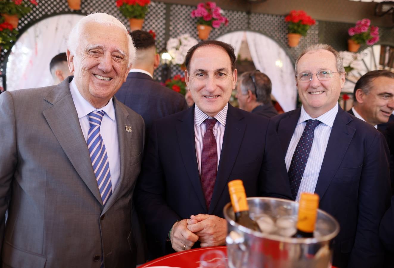 Santiago Herrero, Javier González De Lara, Luis Fernández, en la recepción de Banco Santander