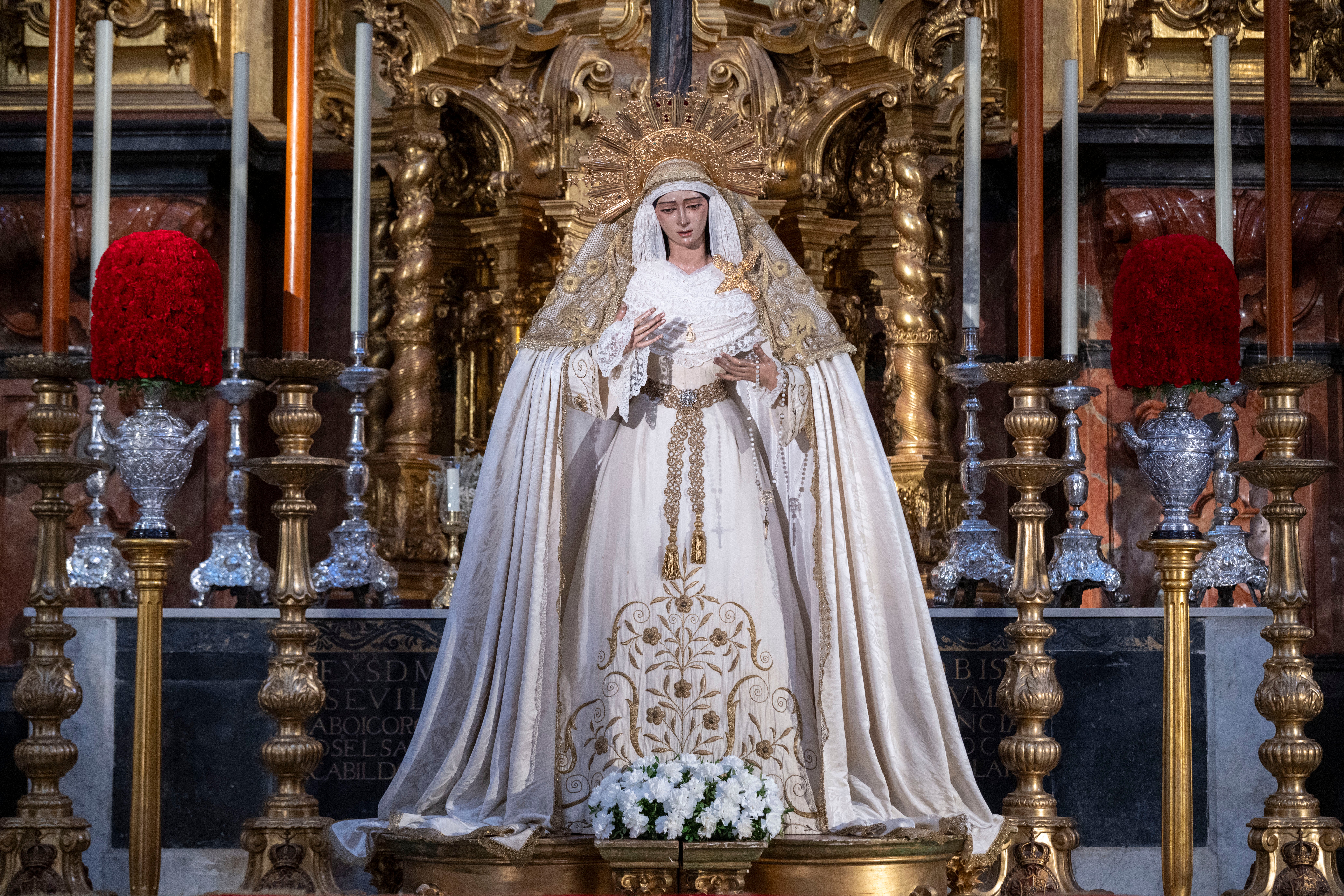 Los titulares del Amor, en el retablo mayor del Salvador